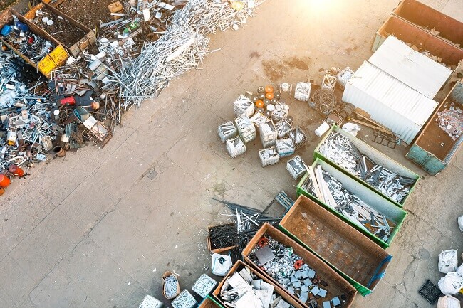 stock-photo-containers-from-a-height-with-different-types-of-metal-sorting-for-remelting-metal-products-2079321196