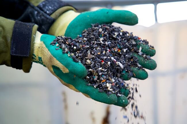 stock-photo-plastic-granulate-in-a-plastic-waste-recycling-plant-2133103497